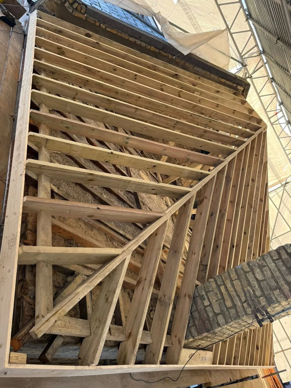 New roof timbers and rafters during a re-roof in St Just